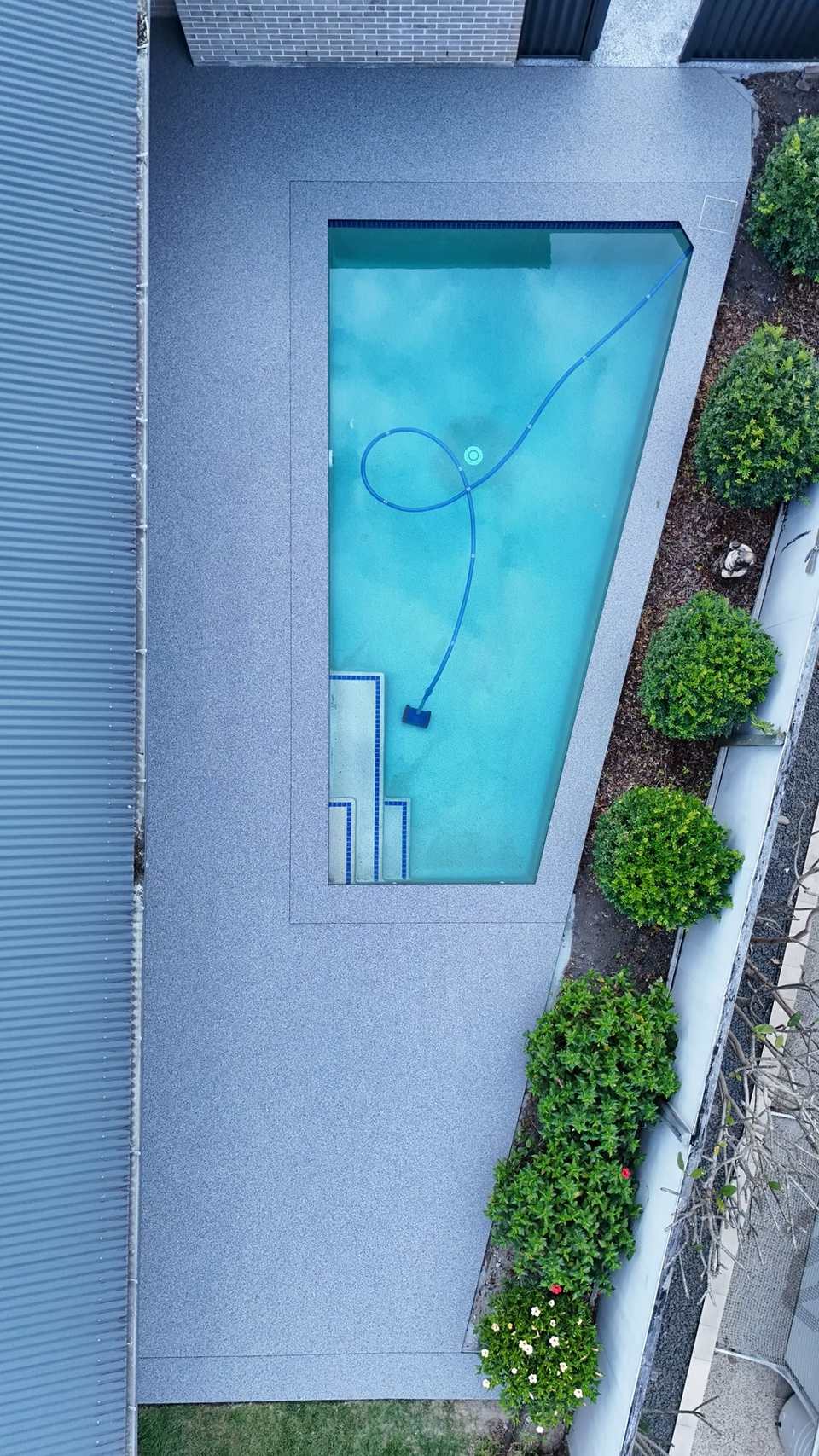 Aerial resin bound pool surround in Upper Coomera — GC Resin Bound Surfaces